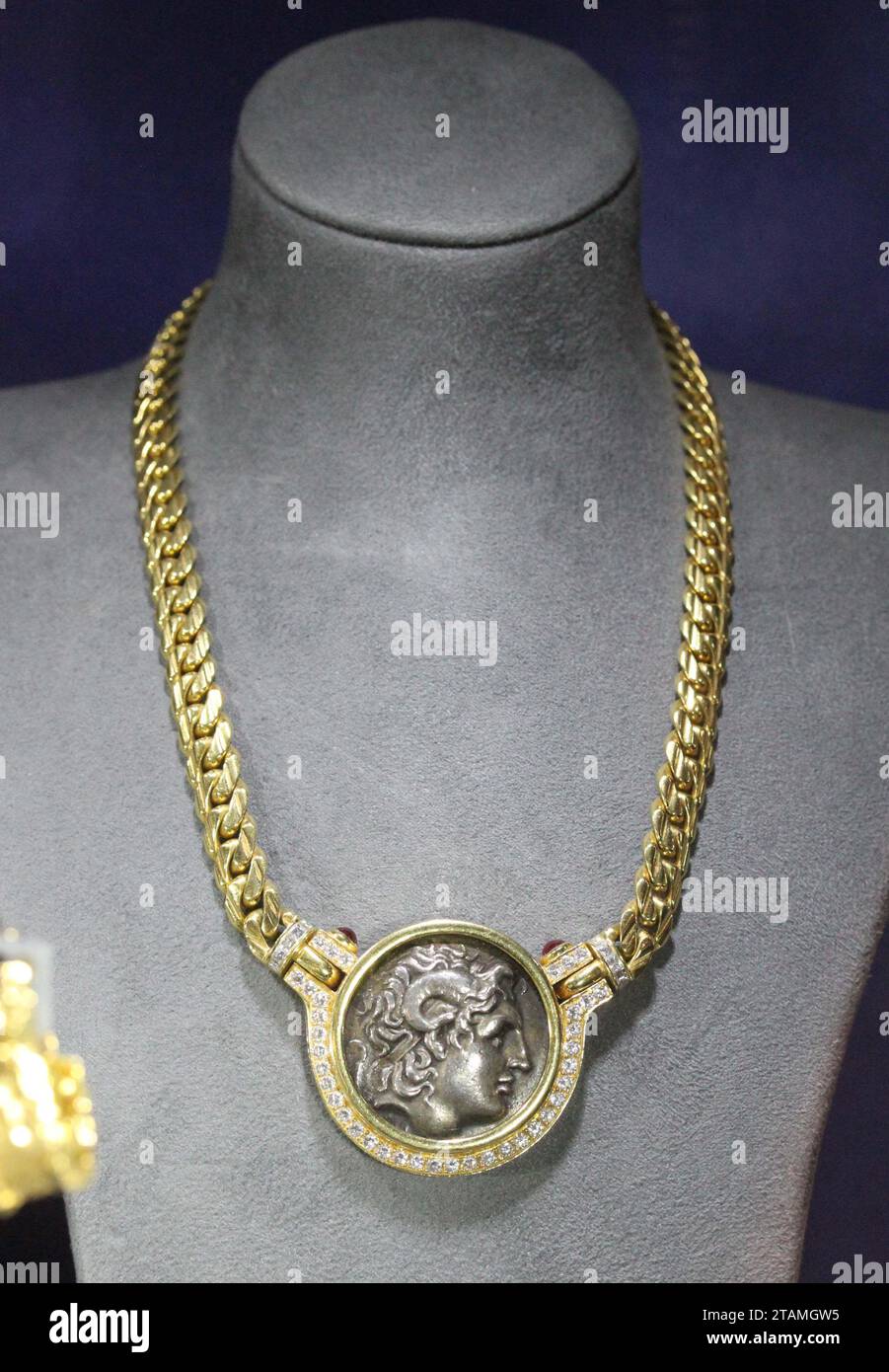 New York, New York, USA. 30th Nov, 2023. Mary Tyler Moore owned Gold, Ancient Coin, Ruby and Diamond 'Monete' Necklace by Bulgari with the pendant featuring an ancient Greek coin estimate $25,000 - $35,000, seen during the press preview for the Magnificent Jewels auction held during Luxury Week at Sotheby's New York. (Credit Image: © Nancy Kaszerman/ZUMA Press Wire) EDITORIAL USAGE ONLY! Not for Commercial USAGE! Stock Photo