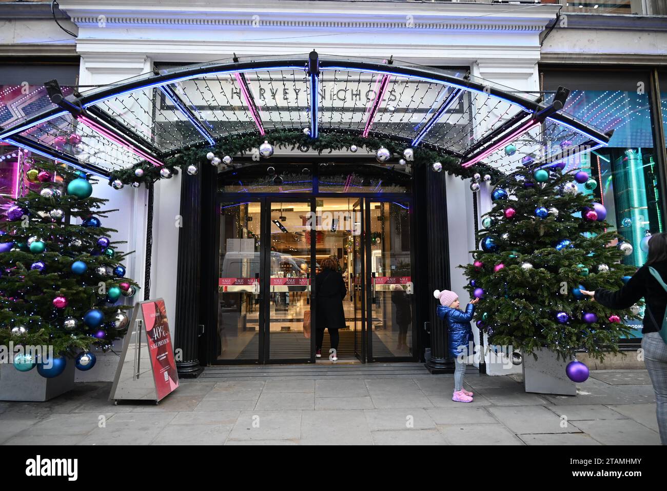 London starting to look like Christmas with visitors shopping goddies stoking up for seasonal celebrations and enjoying the tress and ornaments on display all around the city centre ... Stock Photo