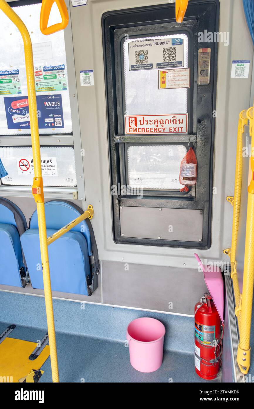 BANGKOK, THAILAND, OCT 28 2023, A emergency exit inside a public transport bus Stock Photo