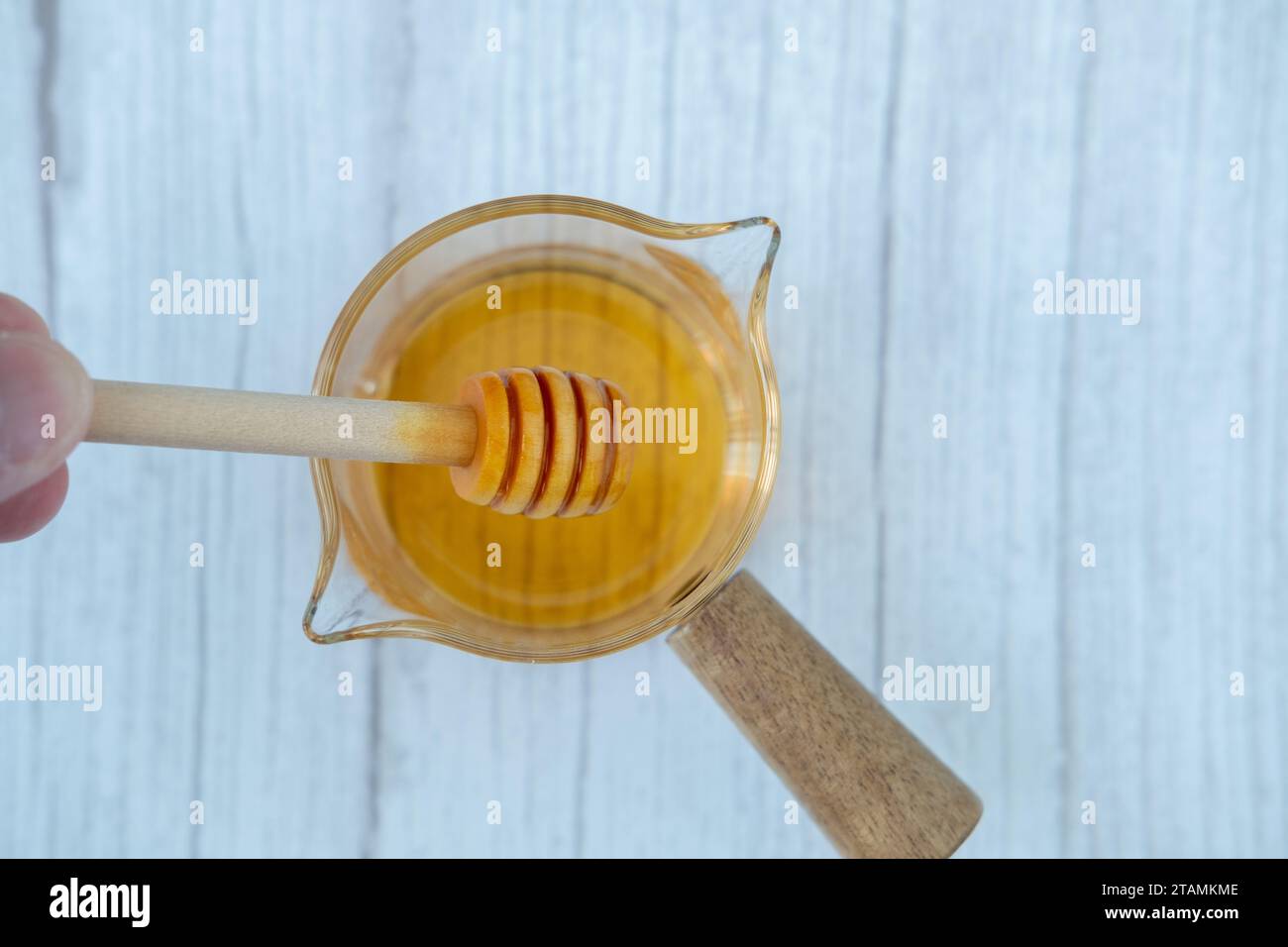 Stirring Hand Reference Close up hand pouring stirring hi-res stock photography and images - Alamy