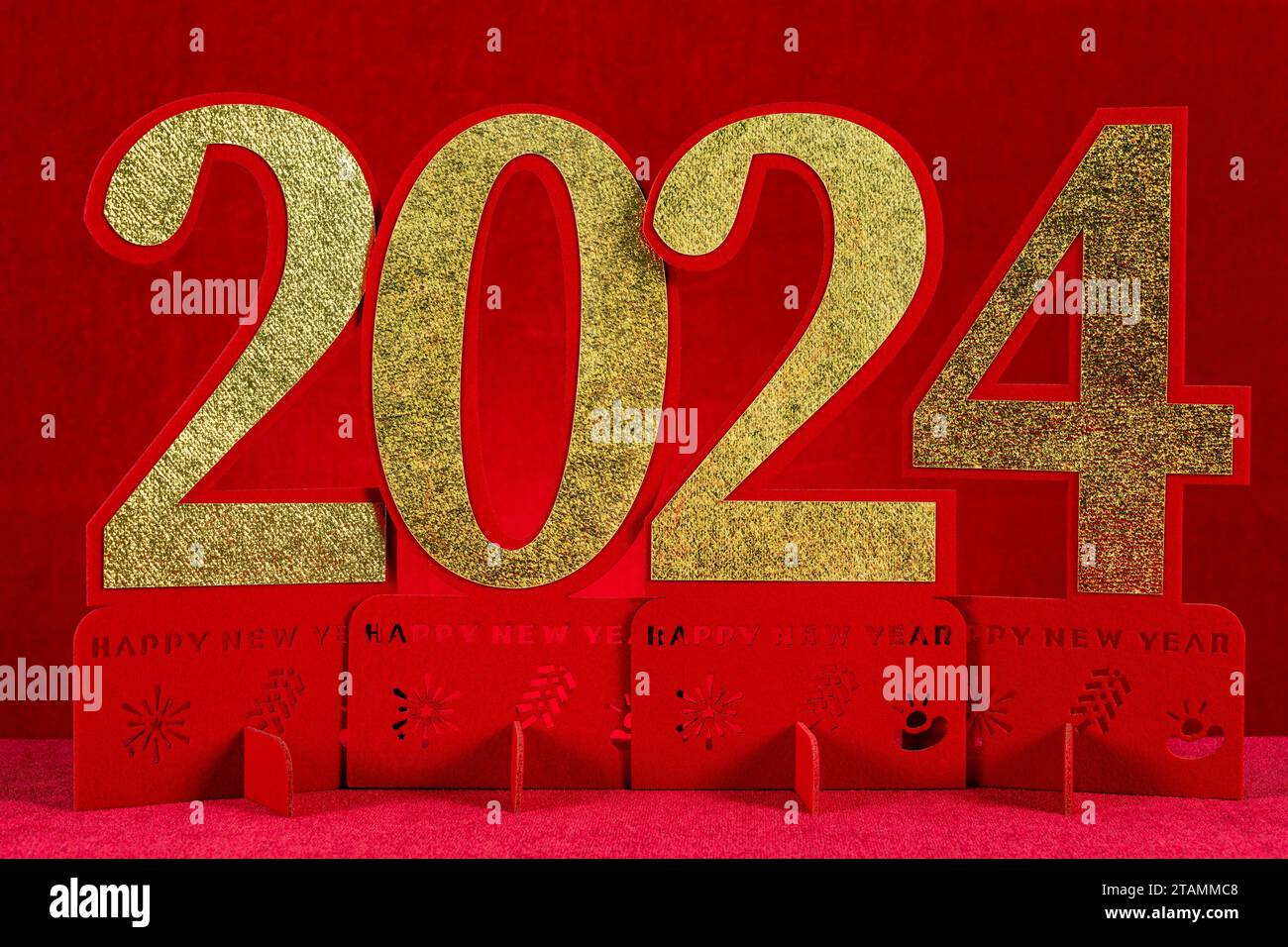 2024 paper cut on red background no logo no trademark Stock Photo