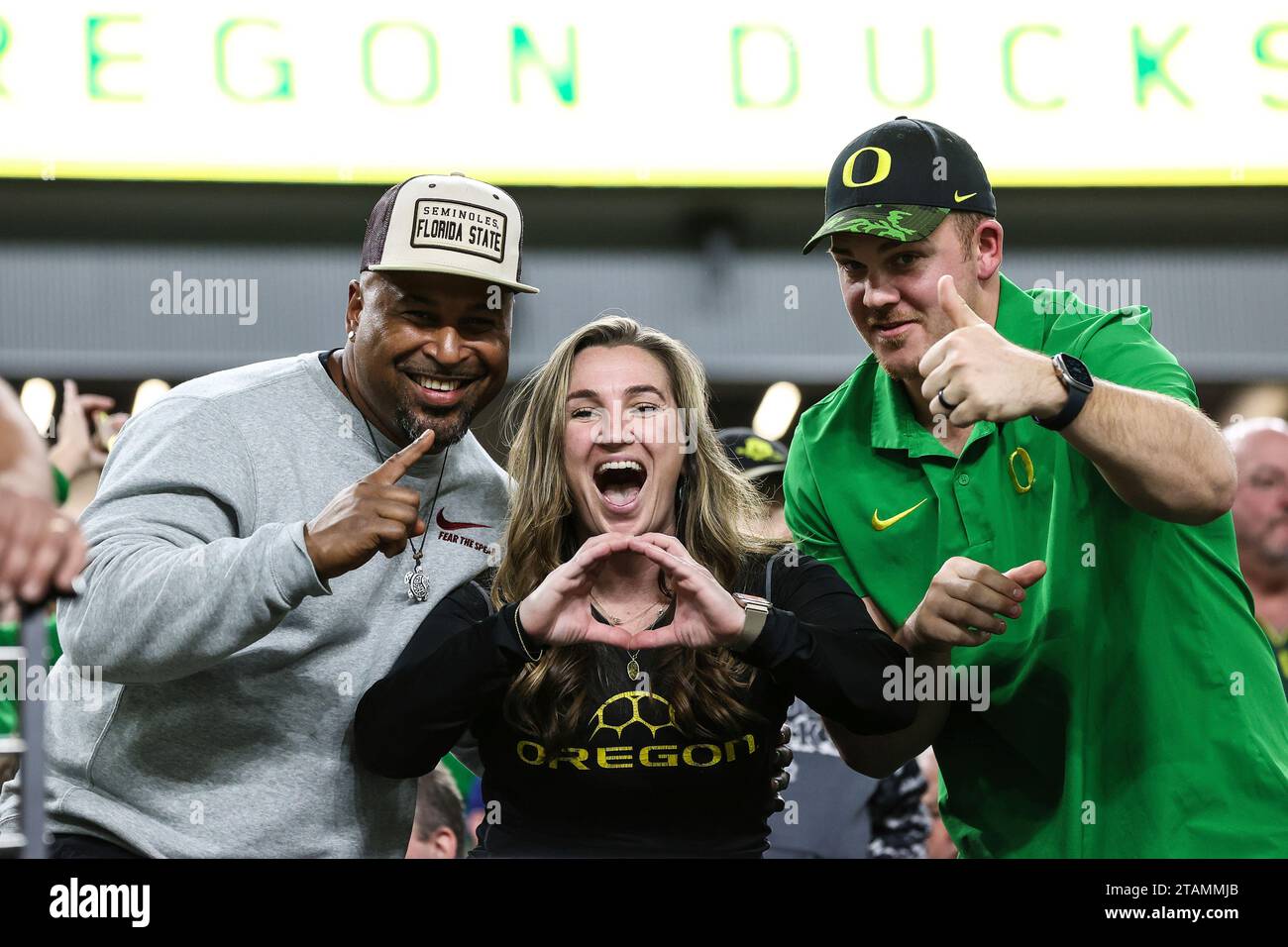 december-01-2023-oregon-ducks-fans-pose-for-the-camera-prior-to-the