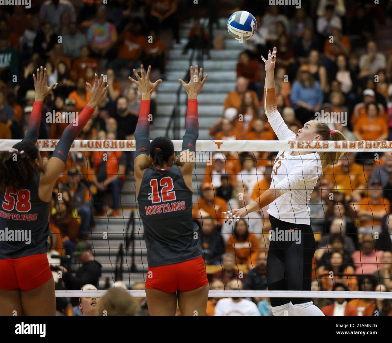 December 1, 2023 Texas outside hitter Jenna Wenaas (13) at the net