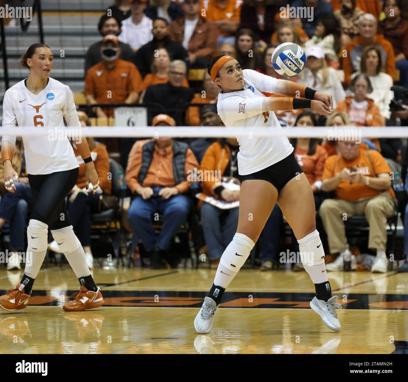 December 1, 2023 Texas defensive specialist Keonilei Akana (12) digs