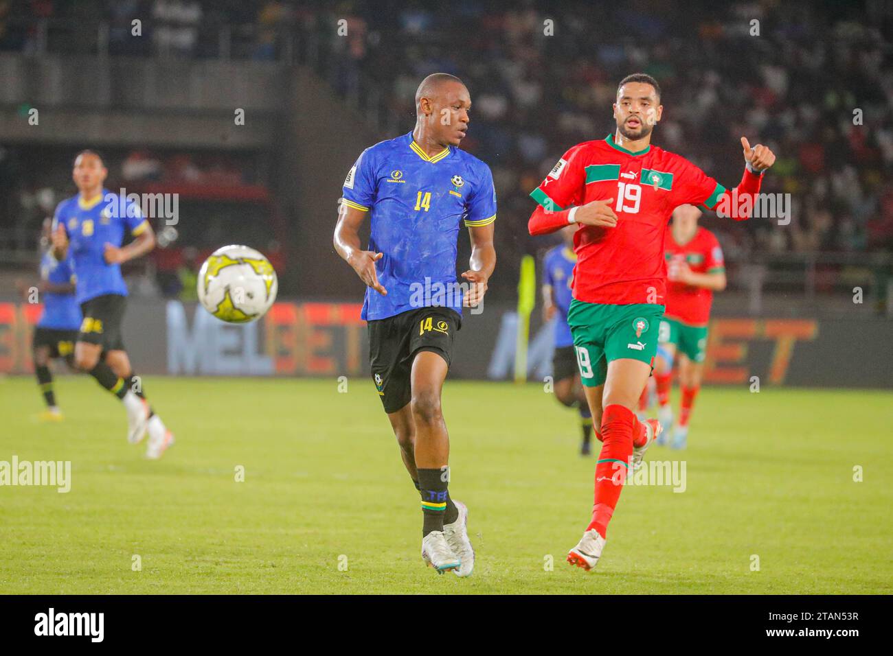 DAR ES SALAAM, TANZANIA  - NOVEMBER 21:   Bakari Mwamnyeto of Tanzania and Youssef En-Nesyri of Morocco during the 2026 FIFA World Cup Qualifiers matc Stock Photo