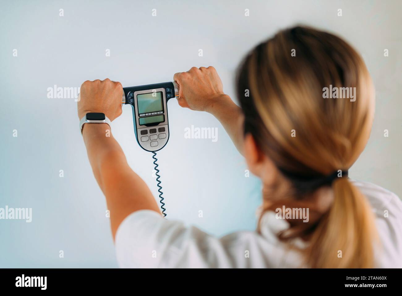 Woman using body composition scales Stock Photo Alamy
