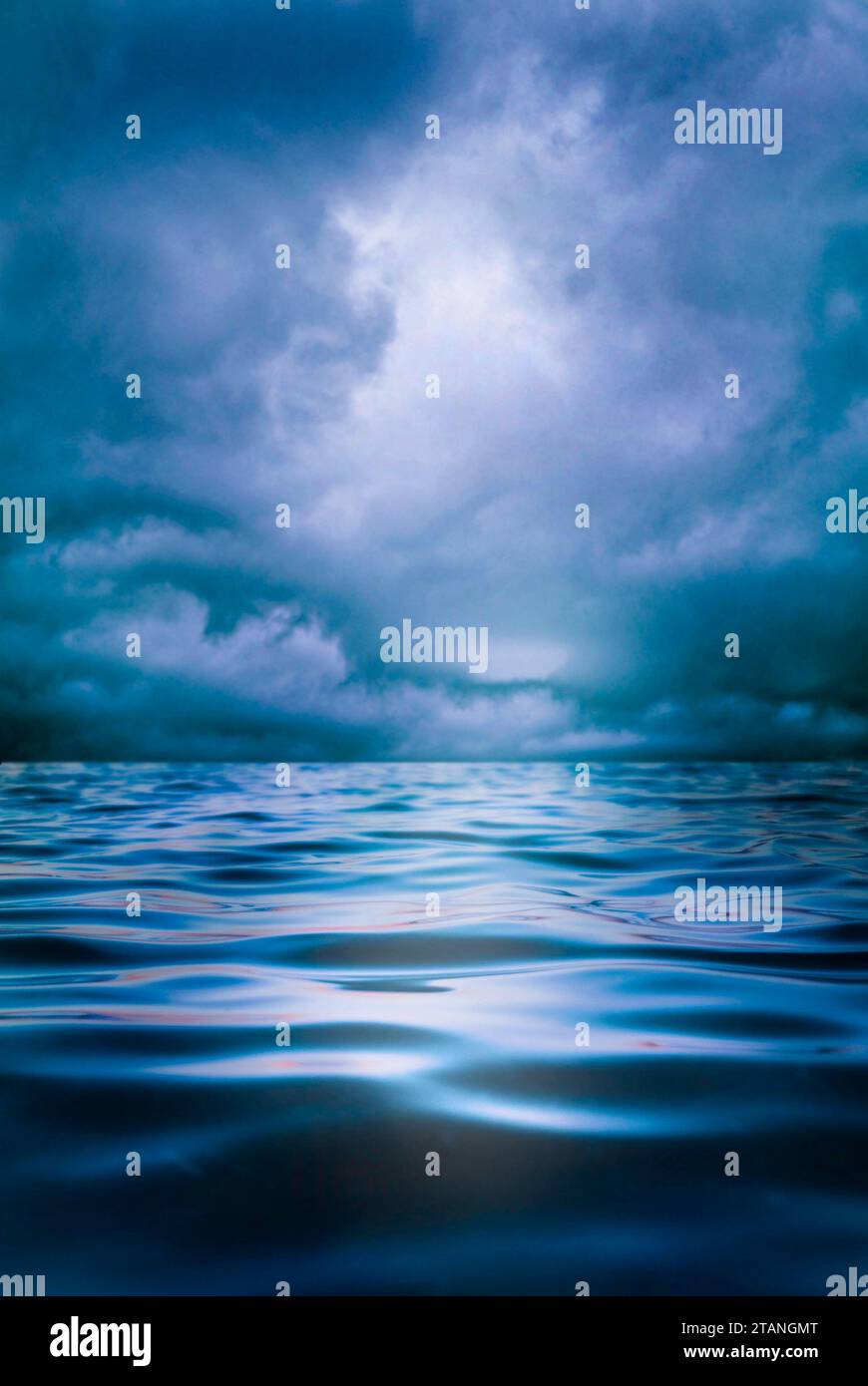 stormy cloudy sky over ocean waves Stock Photo