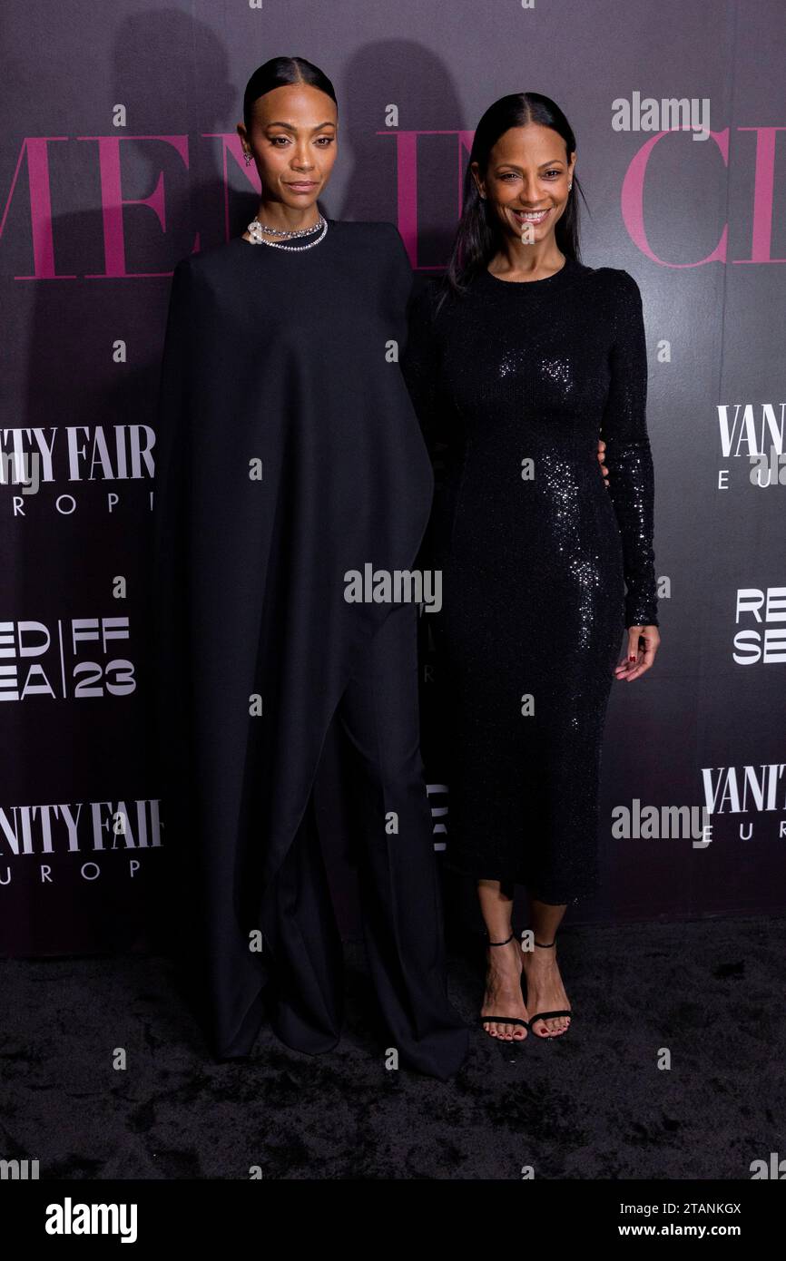 Zoe Saldana, left and sister Cisely Saldana pose for photographers upon