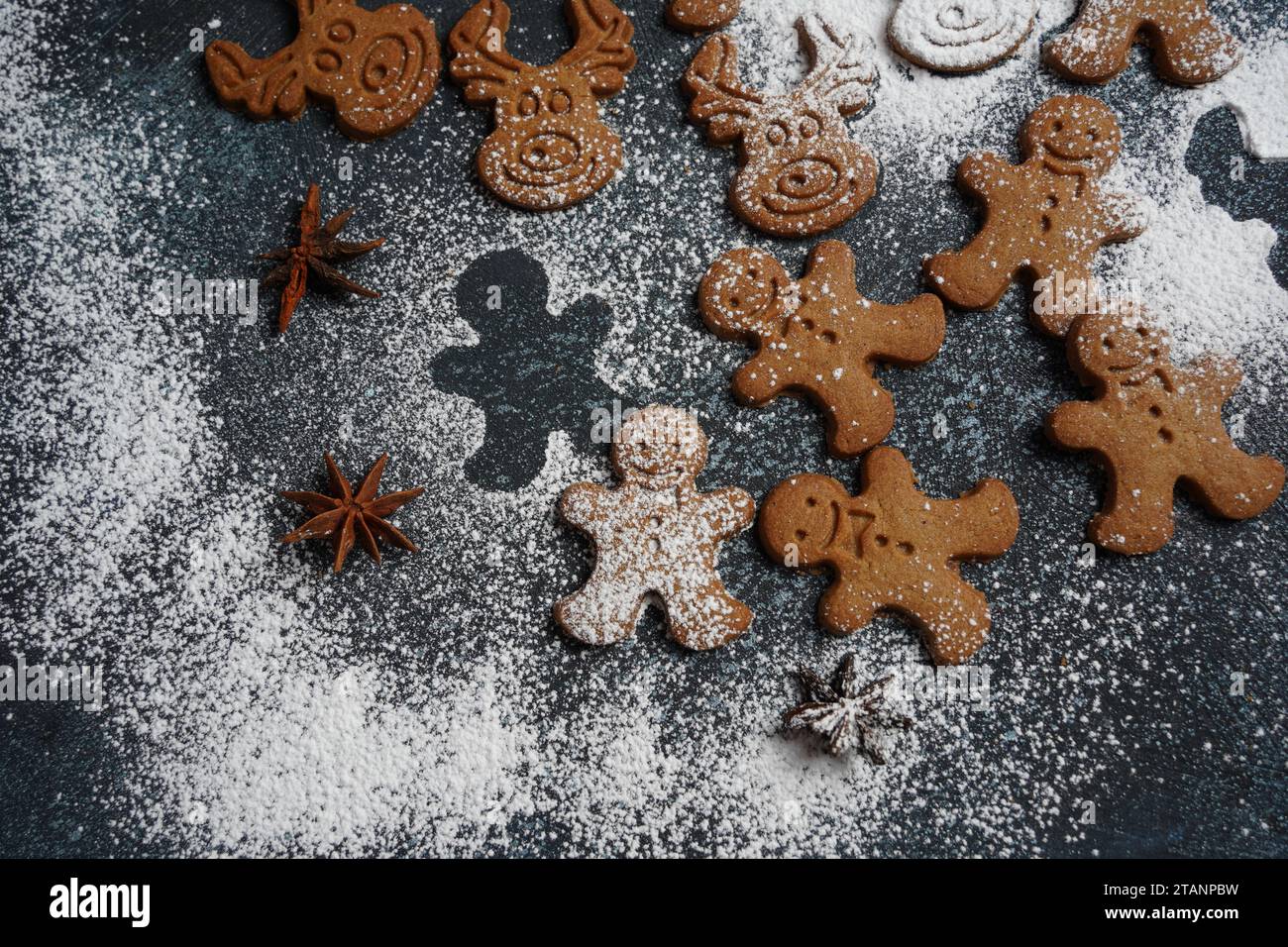 Swedish ginger biscuit shaped in funny form of thins cookies with cinnamon and cloves. New Year concept Stock Photo