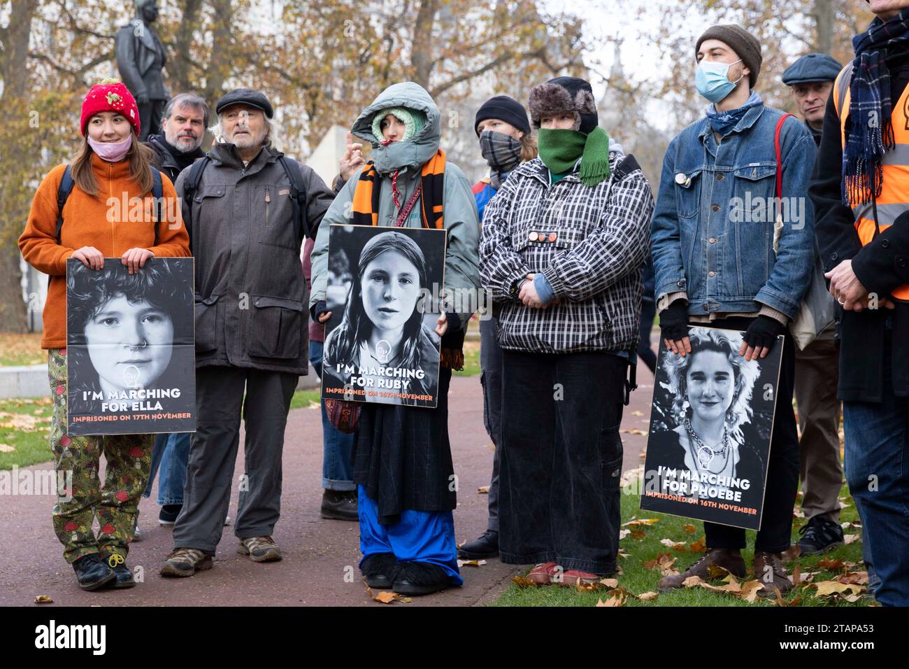 London, UK. 2nd Dec 2023. Just Stop Oil protesters march from New Scotland Yard to the Supreme Court. At least two climate activists were detained. Stock Photo
