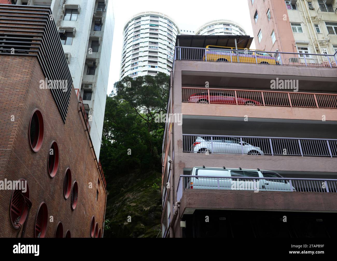 Picture of HONG KONG - JUNE 29, 2014: Multi-level parking in apartment buildings ...