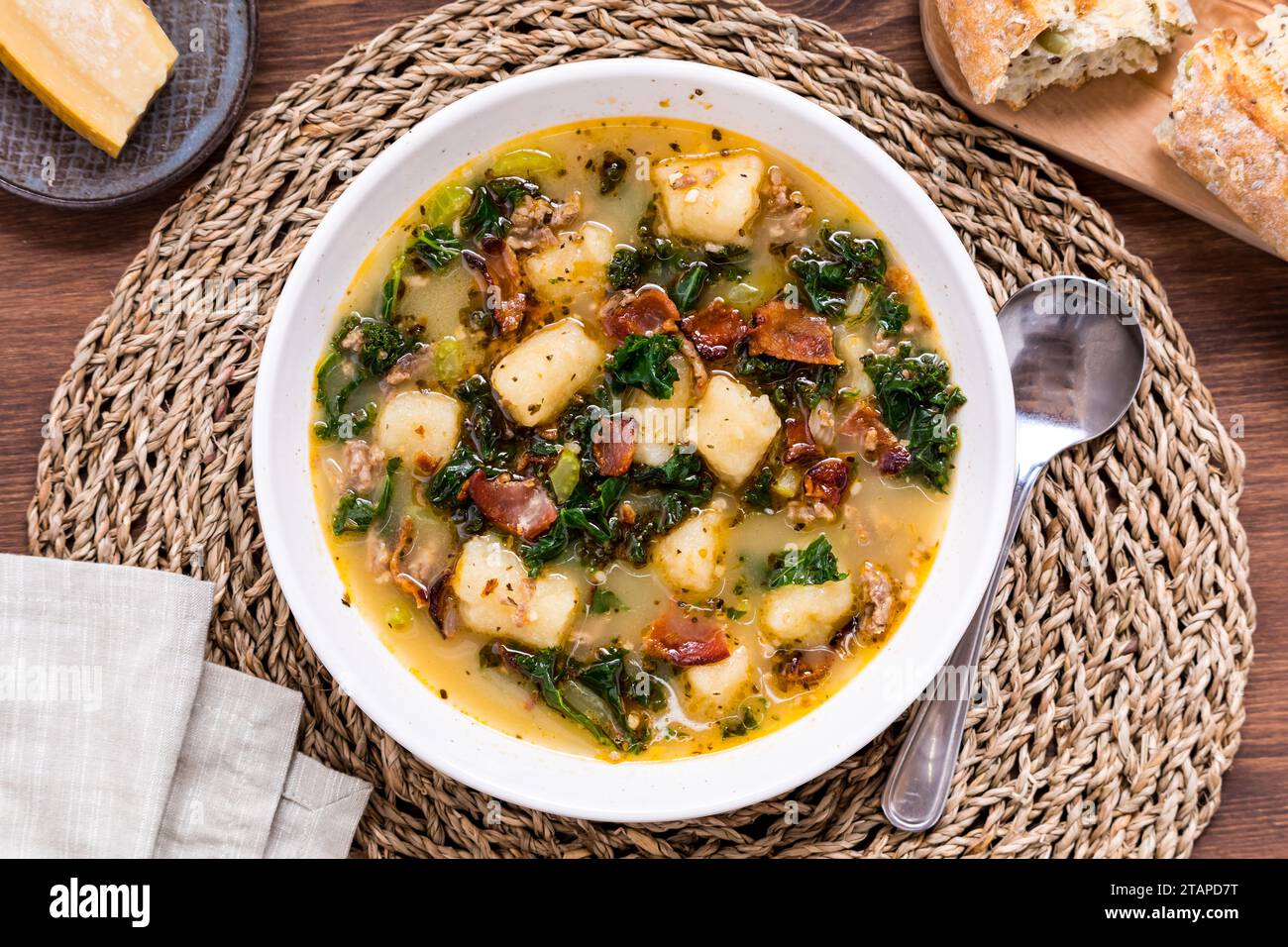 Top down view of Zuppa Toscana soup with cauliflower gnocchi and bacon