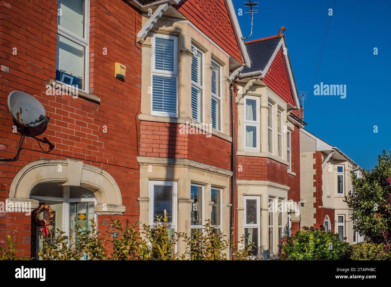 Row of suburban houses in Whitchurch, Cardiff. UK Housing Market. Property Market. Mortgages. Concept. Abstract. Business. Economy. Tax Stock Photo