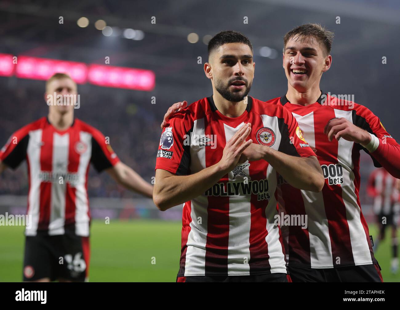 London, UK. 2nd Dec, 2023. Neal Maupay of Brentford celebrates with Yehor Yarmolyuk of Brentford after scoring the opening goal during the Premier League match at Gtech Community Stadium, London. Picture credit should read: Paul Terry/Sportimage Credit: Sportimage Ltd/Alamy Live News Stock Photo