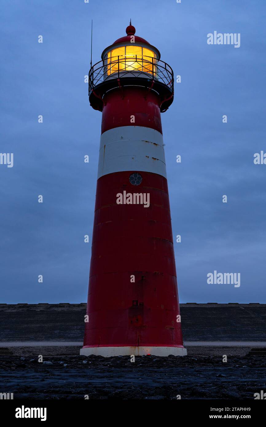 short lighthouse of Westkapelle, Netherlands at dusk Stock Photo