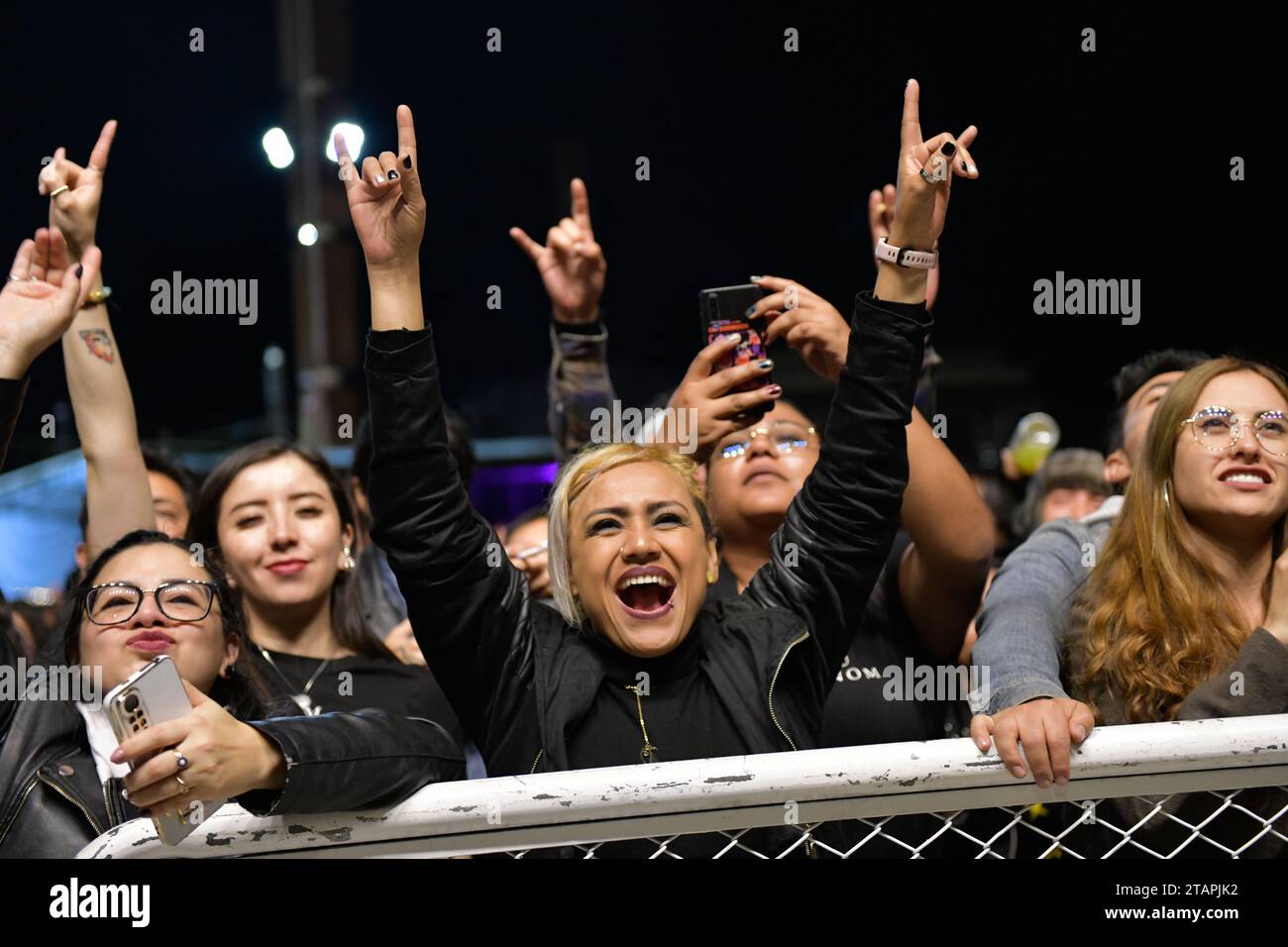 Pasto, Colombia. 26th Nov, 2023. Festival goers enjoy multiple bands during the Galeras Rock Fest, 2023 in Pasto, Narino, Colombia, November 26, 2023. Photo by: Camilo Erasso/Long Visual Press Credit: Long Visual Press/Alamy Live News Stock Photo