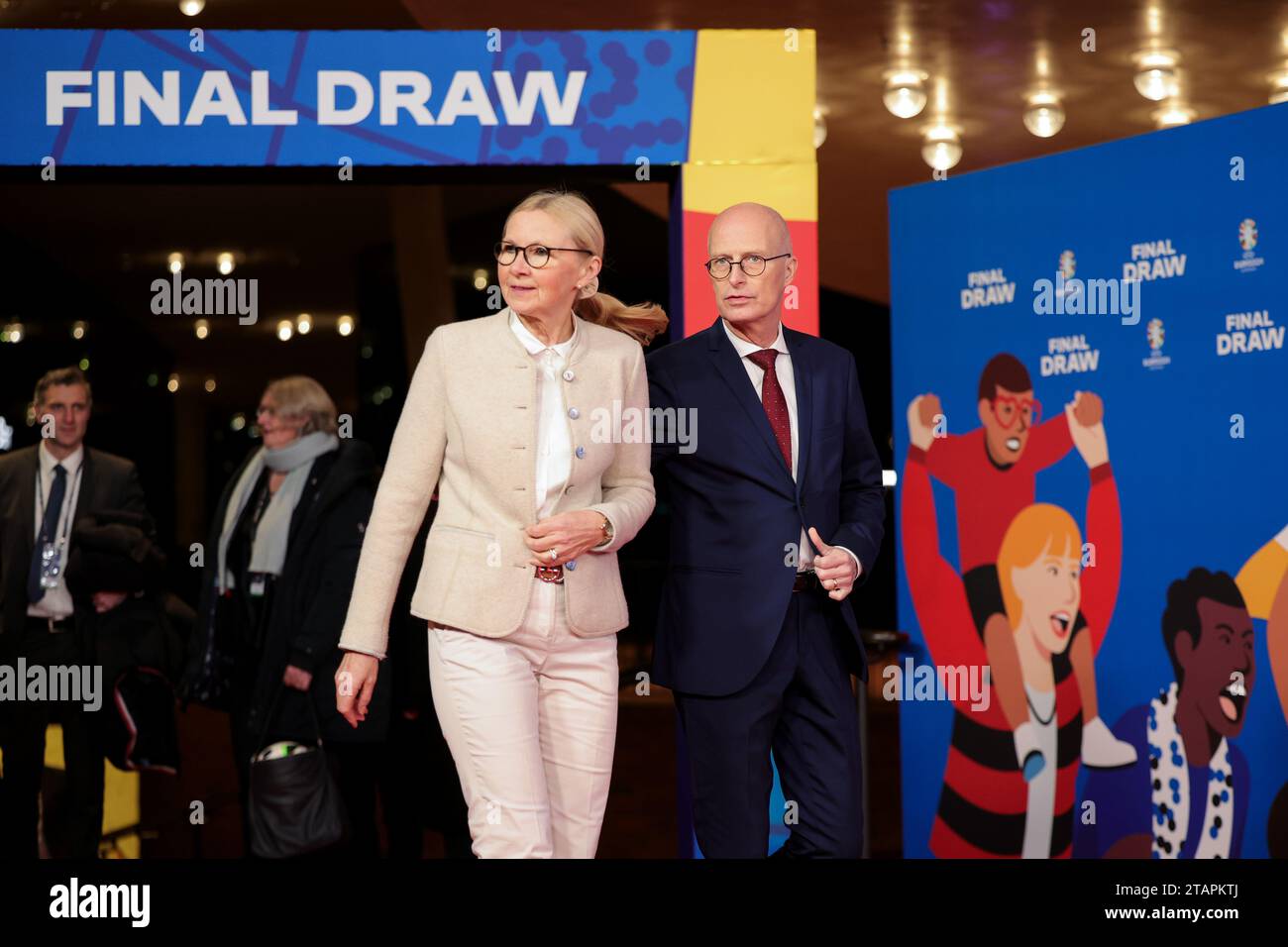 Hamburg, Germany. 02nd Dec, 2023. Soccer: European Championship, draw in Hamburg, Elbphilharmonie. Peter Tschentscher (SPD), First Mayor of the Free and Hanseatic City of Hamburg, and his wife Eva-Maria Tschentscher attend the event. Credit: Christian Charisius/dpa/Alamy Live News Stock Photo