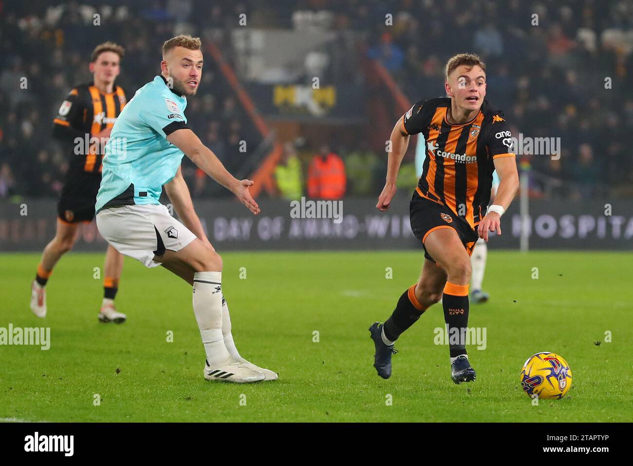 Hull, UK. 02nd Dec, 2023. Scott Twine of Hull City looks to get past ...