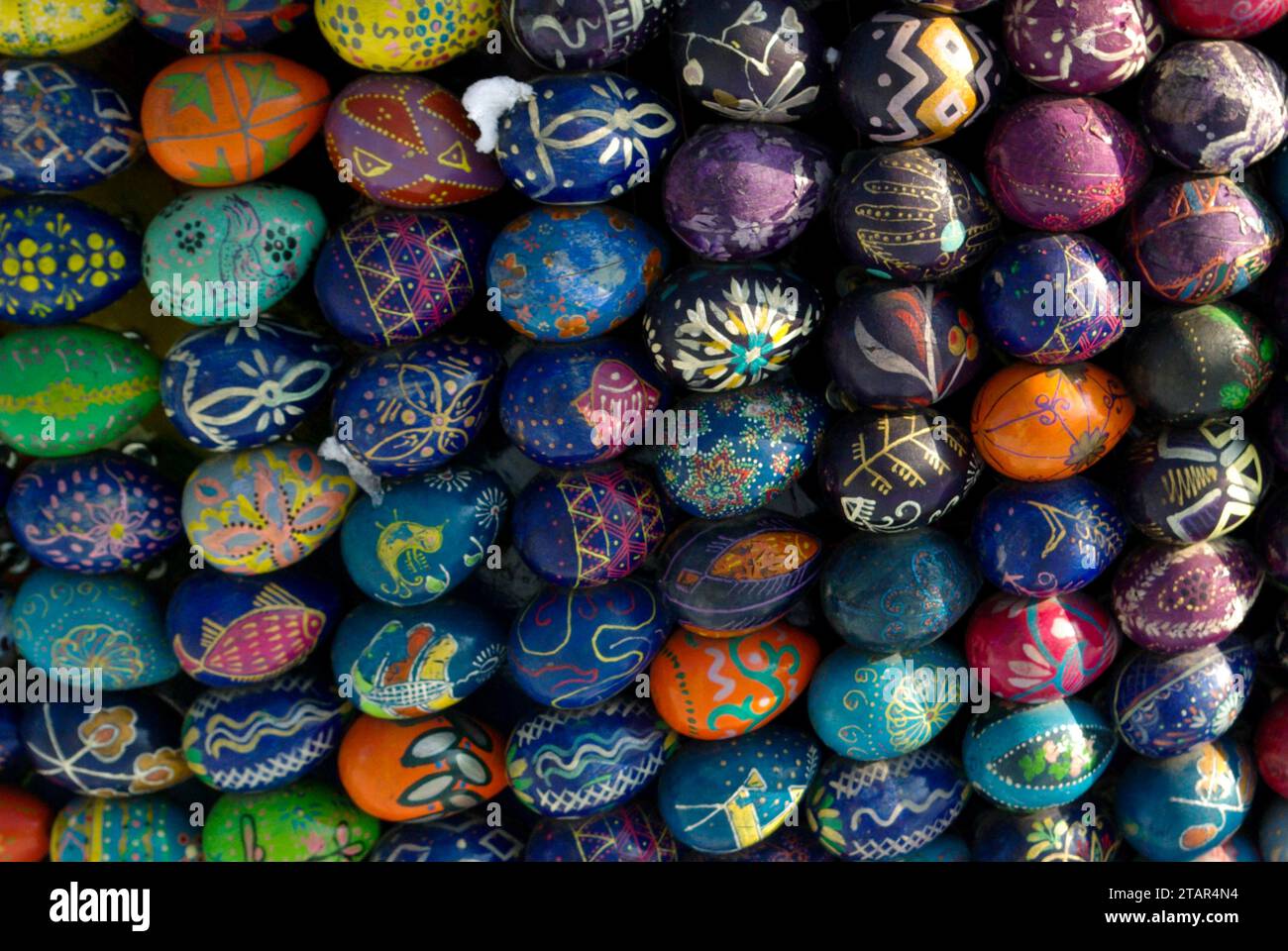 Easter eggs forming a shape on snow Stock Photo