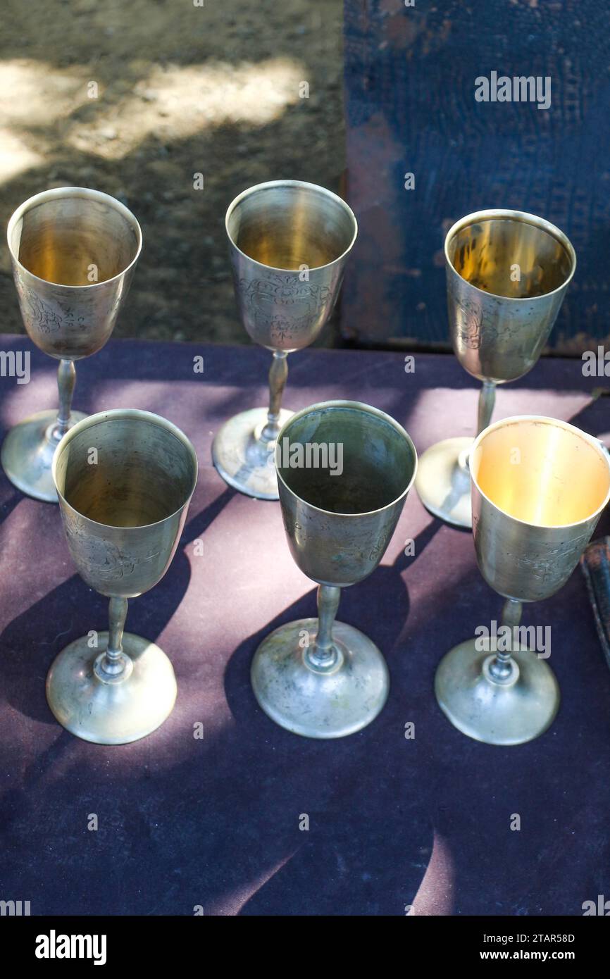 Drinking glasses made of metal of various color Stock Photo Alamy