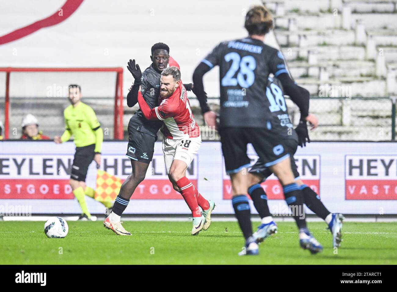 Antwerp, Belgium. 02nd Dec, 2023. OHL's Nathaniel Opoku and Antwerp's Vincent Janssen pictured