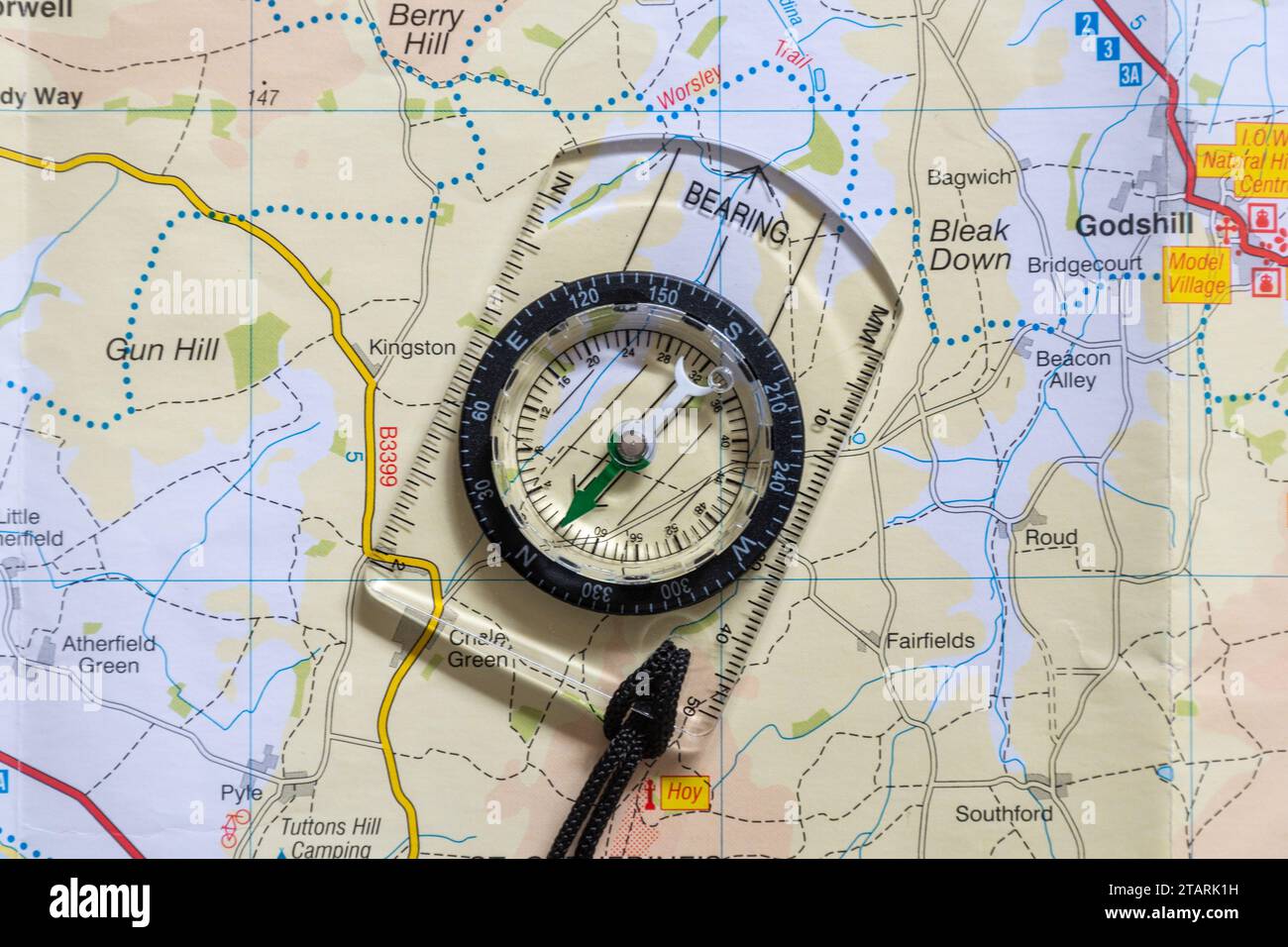 A map and compass, England, UK. Concept: navigation, finding your way, direction, bearing Stock Photo