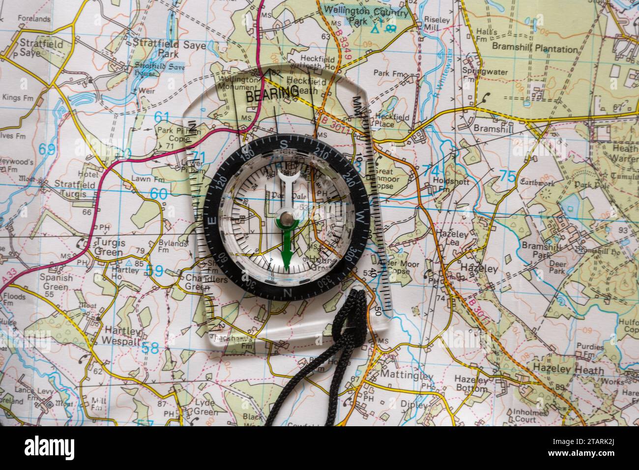 A map and compass, England, UK. Concept: navigation, finding your way, direction, bearing Stock Photo