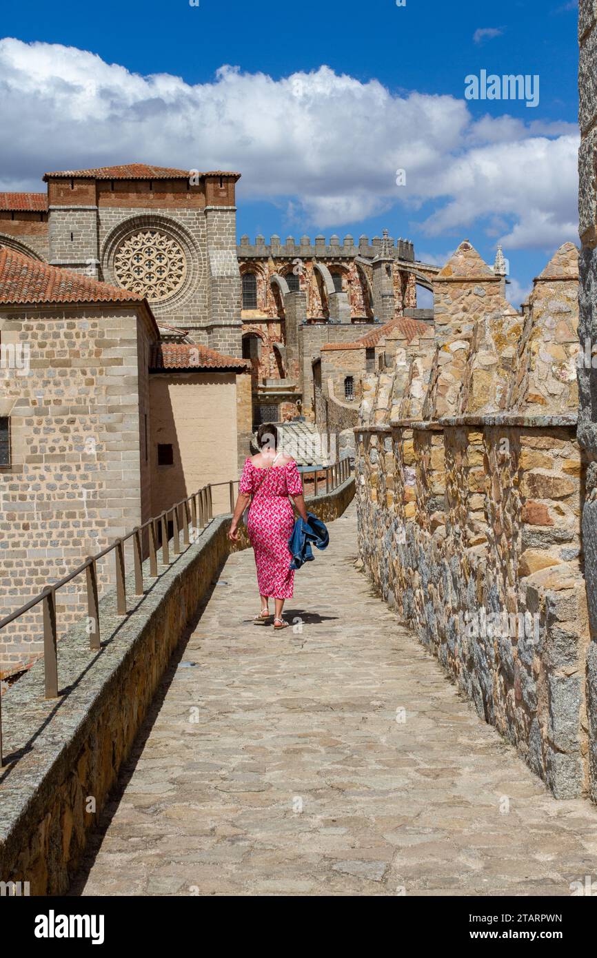 Woman walking on the ramparts of the fortified city walls in the
