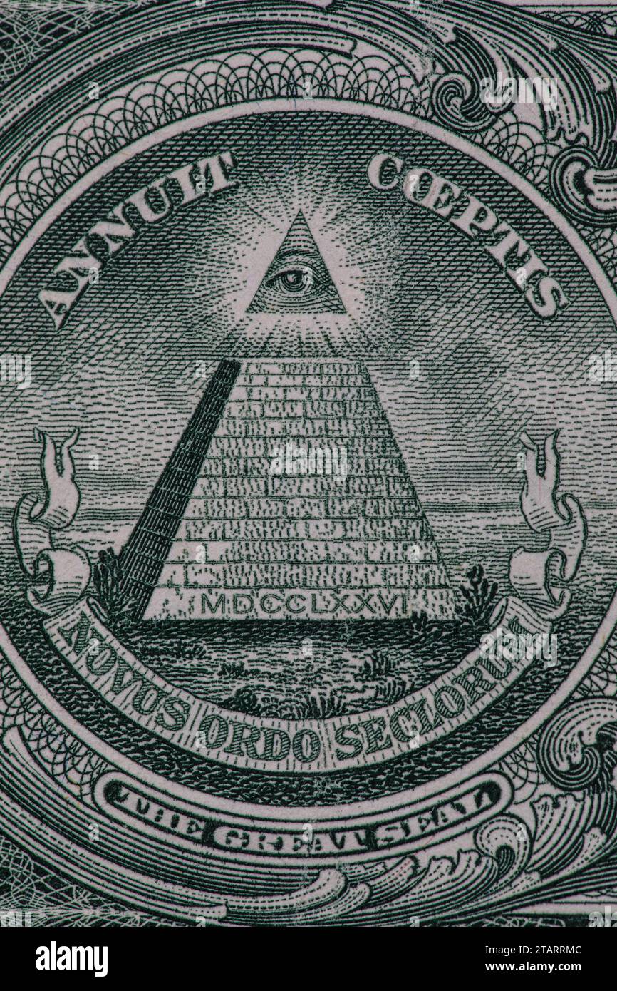 Close up of a small section of a one dollar bill showing the all seeing ...
