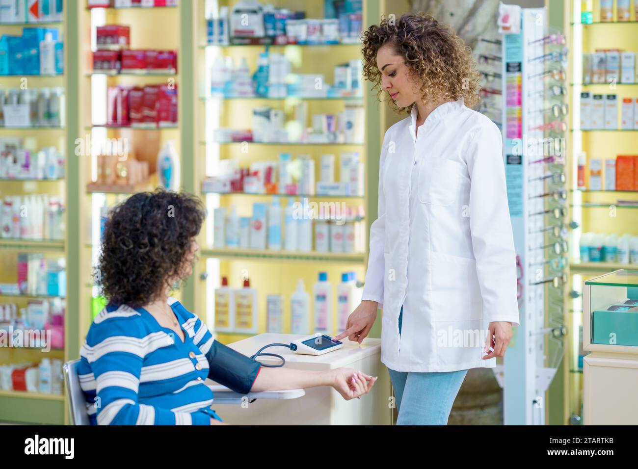 Blurred view female pharmacist hi-res stock photography and images - Alamy