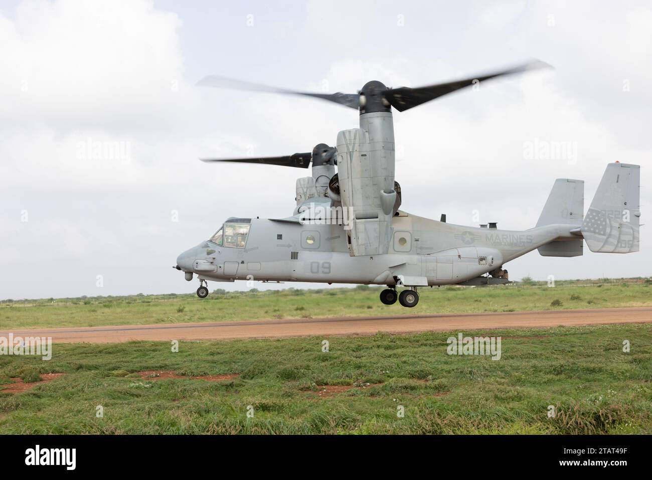 A U.S. Marine Corps MV-22B Osprey with Marine Medium Tiltrotor Squadron Reinforced (VMM) 261 REIN, lands after Aerial delivery operations at an undisclosed location, Nov. 19, 2023. Combined Joint Task Force-Horn of Africa (CJTF-HOA) helps counter transnational threats and malign actors, protects U.S. interests, responds to crises, and strengthens alliances and partnerships to advance U.S. national interests and promote regional security, stability, and prosperity through defense, diplomacy and development (3D’s) activities. (U.S. Marine Corps photo by Lance Cpl. Anakin Smith) Stock Photo