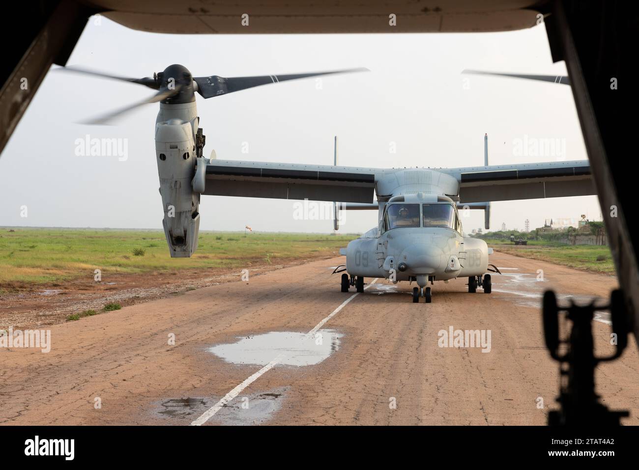 Two U.S. Marine Corps MV-22B Osprey with Marine Medium Tiltrotor Squadron Reinforced (VMM) 261 REIN, land for refueling at an undisclosed location, Nov. 19, 2023. Combined Joint Task Force-Horn of Africa (CJTF-HOA) helps counter transnational threats and malign actors, protects U.S. interests, responds to crises, and strengthens alliances and partnerships to advance U.S. national interests and promote regional security, stability, and prosperity through defense, diplomacy and development (3D’s) activities. (U.S. Marine Corps photo by Lance Cpl. Anakin Smith) Stock Photo