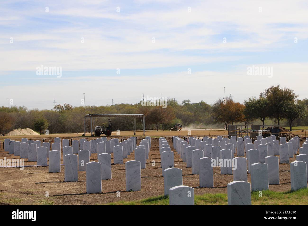 San Antonio, USA. 01st Dec, 2023. Fresh sod and permanent headstones on