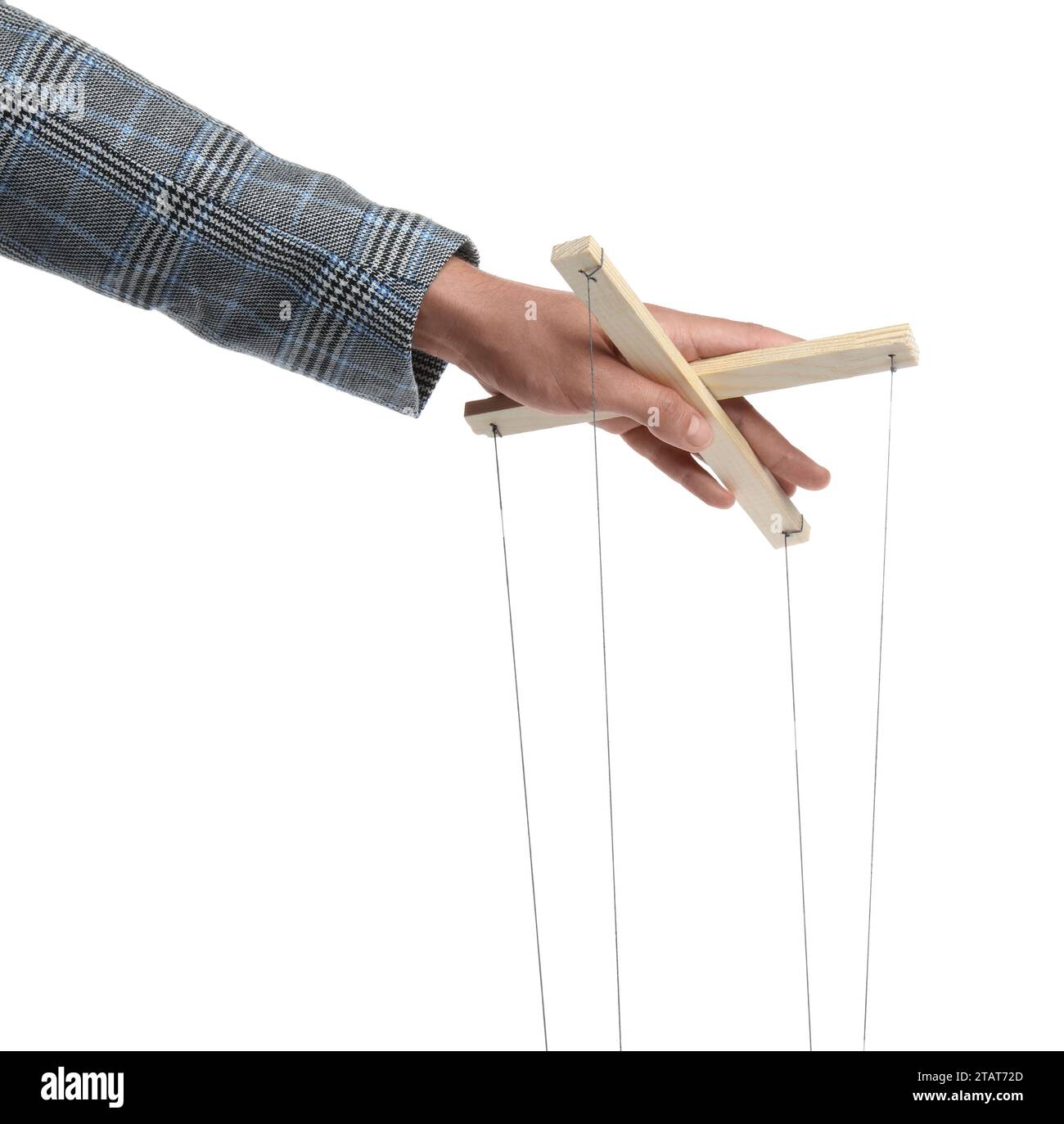 Man holding puppet control bar with strings on white background