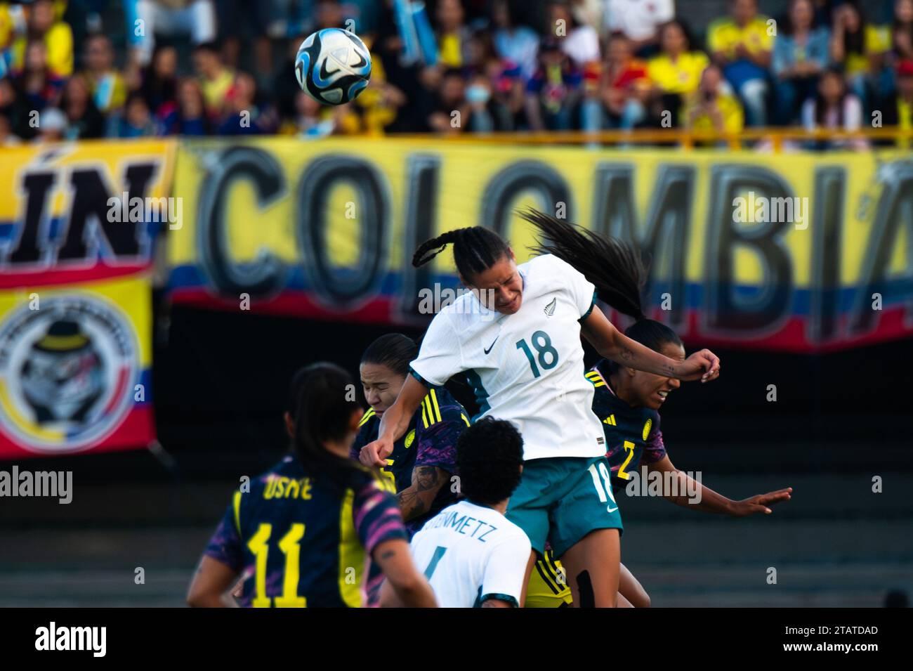 Bogota, Colombia. 02nd Dec, 2023. New Zealand's Grace Jale jumps for a headshot during the woman international friendly match between Colombia and New Zealand at El Campin Stadium in Bogota, December 2, 2023. Photo by: Sebastian Barros/Long Visual Press Credit: Long Visual Press/Alamy Live News Stock Photo