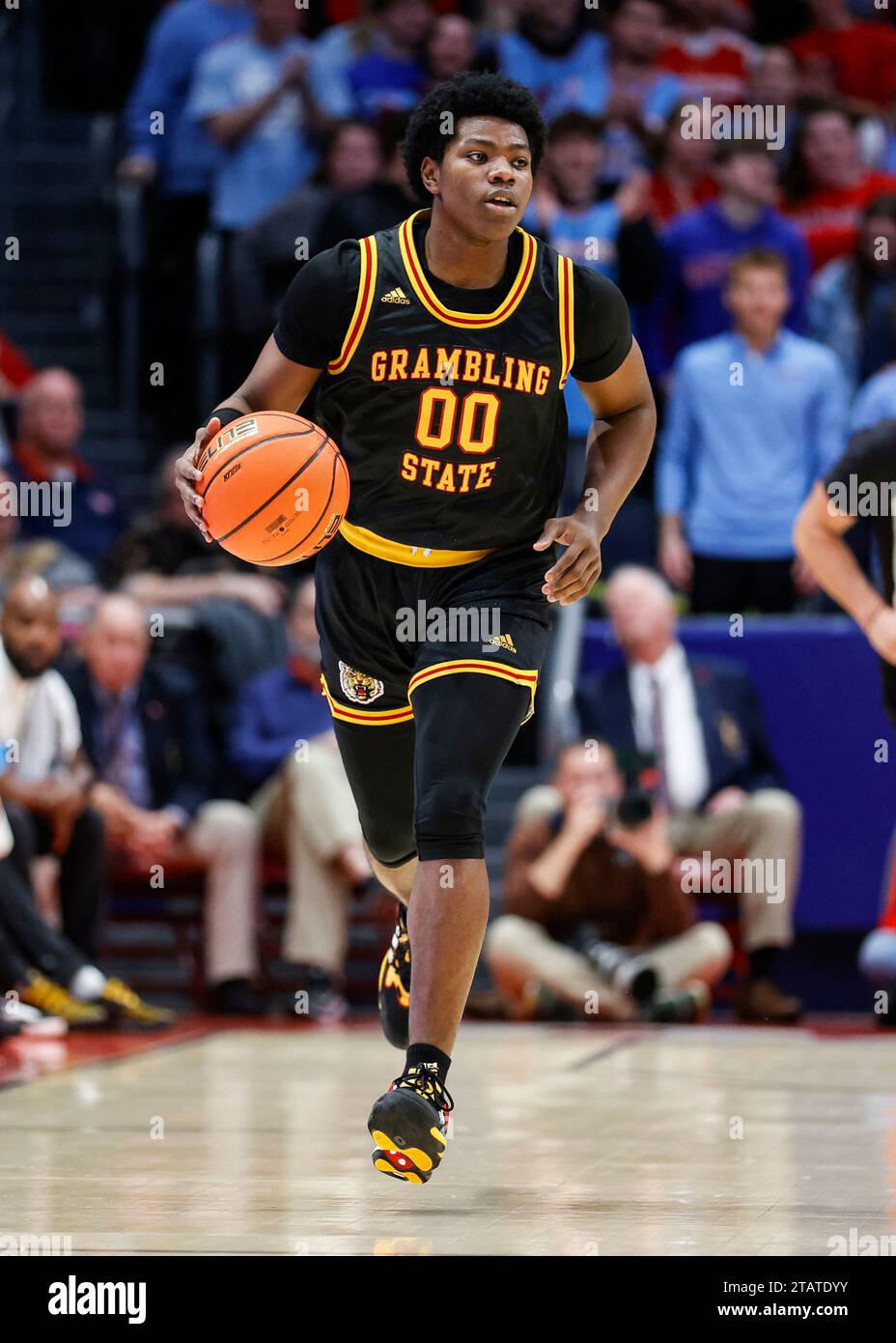 Dayton, USA. 02nd Dec, 2023. Kintavious Dozier (00) moves the ball up
