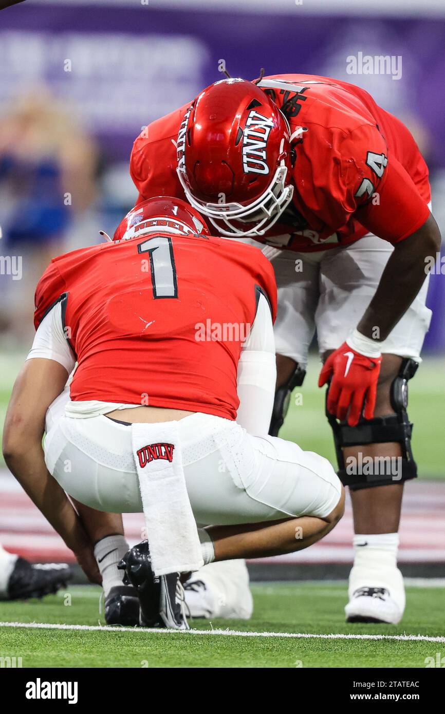 December 02, 2023: UNLV Rebels offensive lineman Jalen St. John (74) check on UNLV Rebels quarterback Jayden Maiava (1) during the second half of the Mountain West Football Championship game featuring the Boise State Broncos and the UNLV Rebels at Allegiant Stadium in Las Vegas, NV. Christopher Trim/CSM. Stock Photo