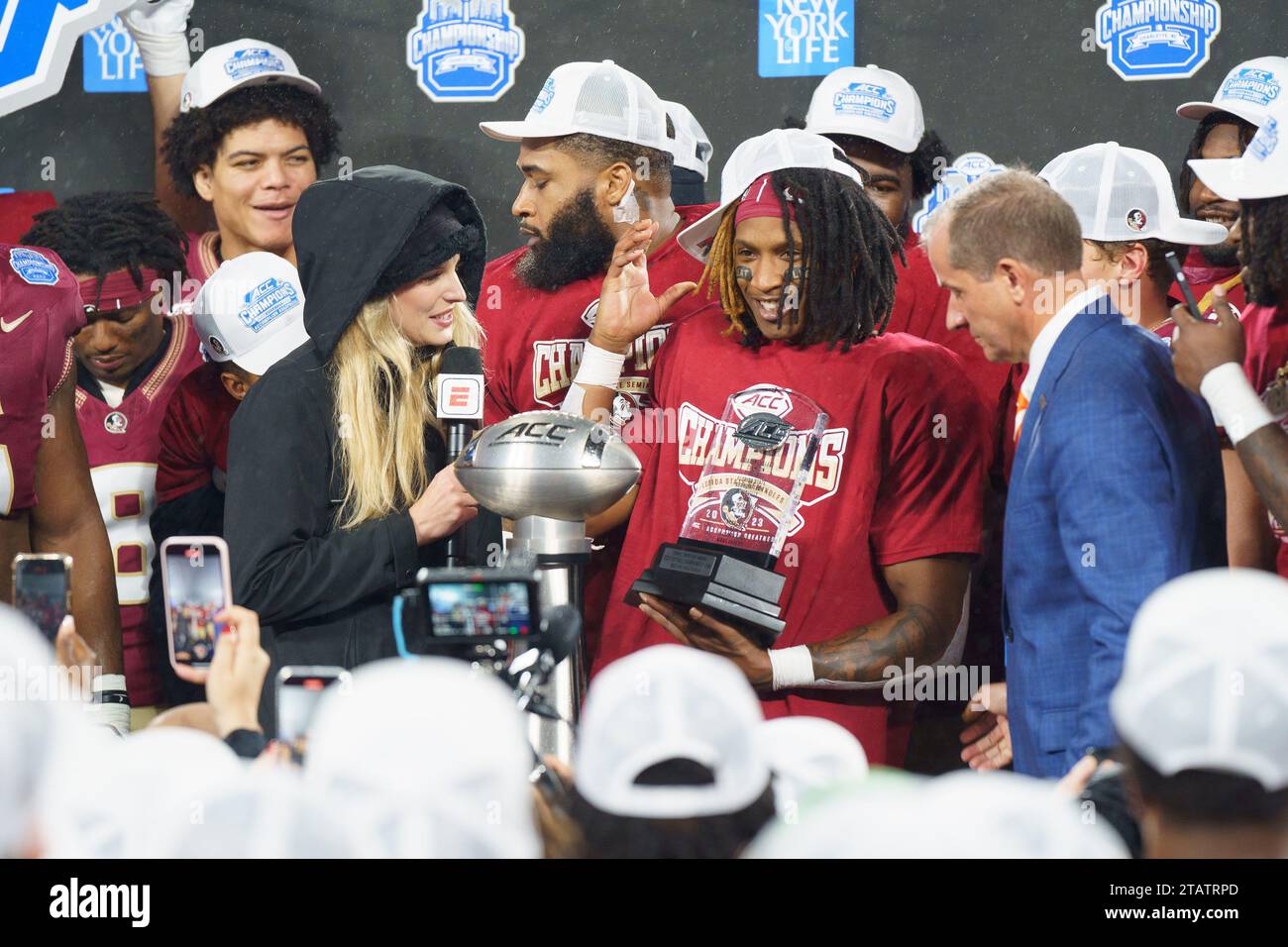 Charlotte, North Carolina, USA. 3rd Dec, 2023. Florida State runningback LAWRANCE TOAFILI is presented with his MVP trophy at the 2023 ACC Football Championship Game. (Credit Image: © Josh Brown/ZUMA Press Wire) EDITORIAL USAGE ONLY! Not for Commercial USAGE! Stock Photo