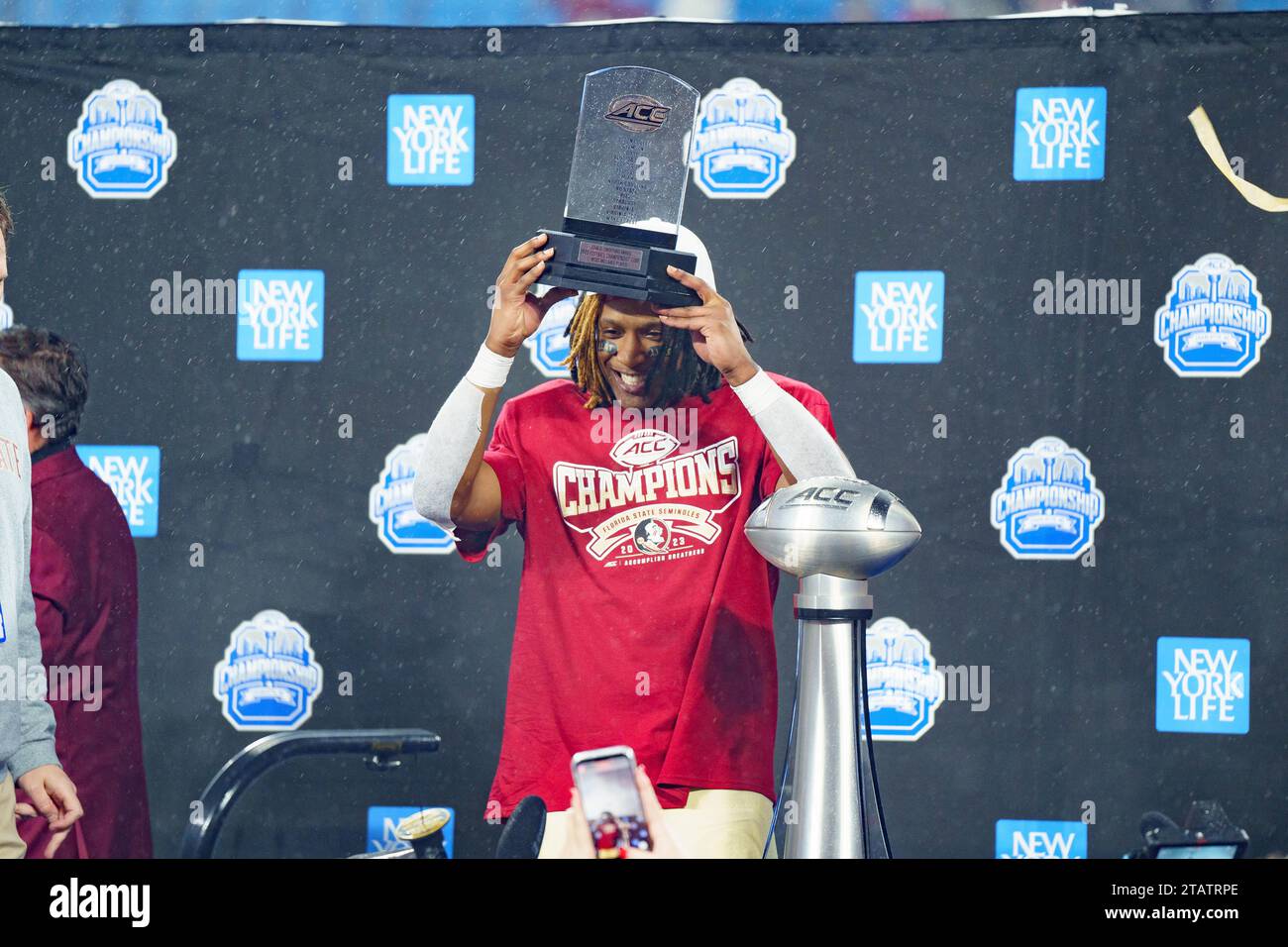 Charlotte, North Carolina, USA. 3rd Dec, 2023. Florida State runningback LAWRANCE TOAFILI is presented with his MVP trophy at the 2023 ACC Football Championship Game. (Credit Image: © Josh Brown/ZUMA Press Wire) EDITORIAL USAGE ONLY! Not for Commercial USAGE! Stock Photo