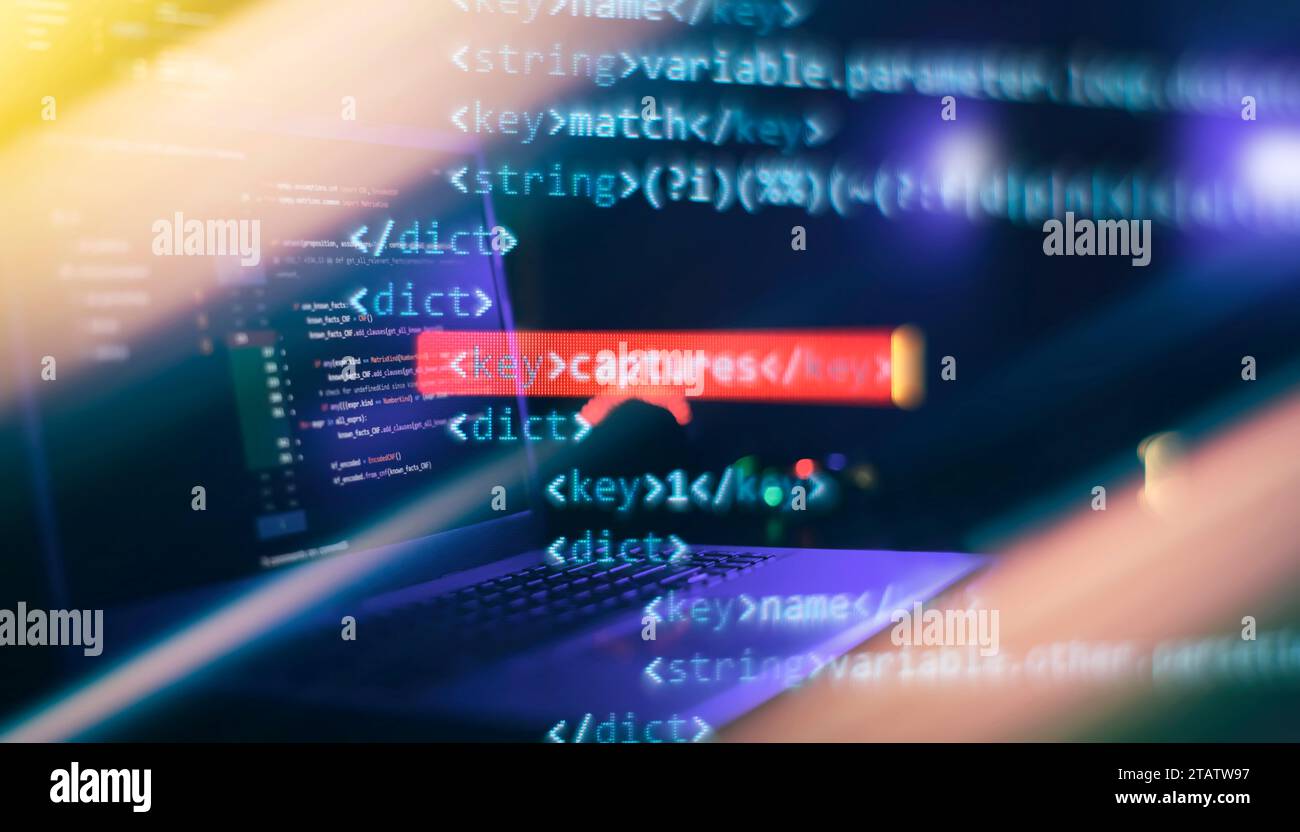 IT specialist workplace. Computer code data. Project managers Stock Photo