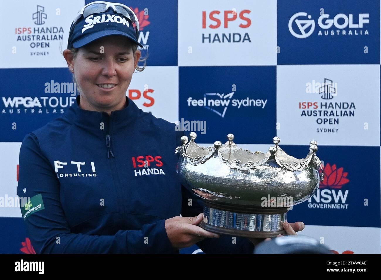 South Africa's Ashleigh Buhai holds the women's trophy after wining the