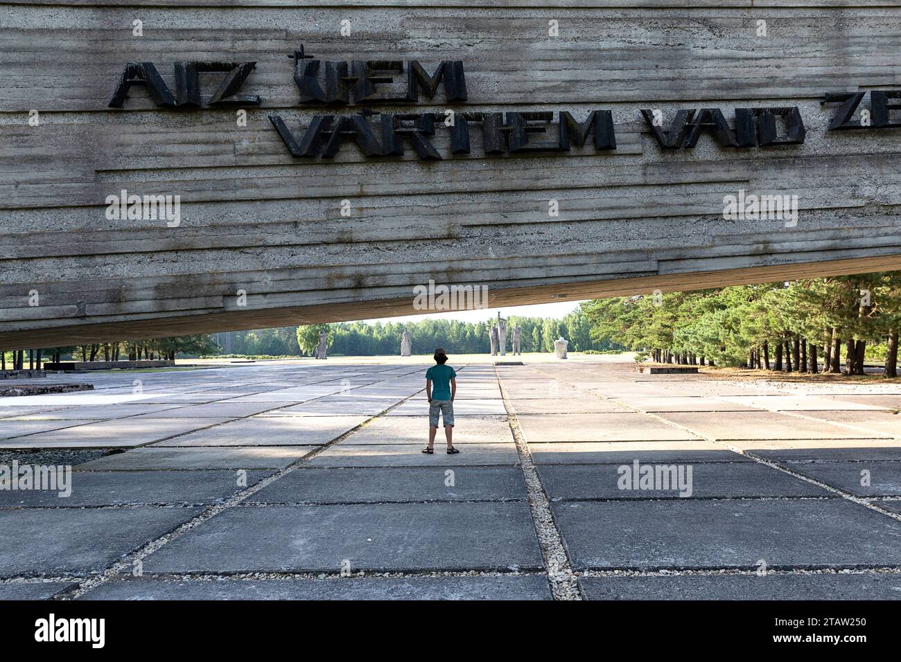 Tourist visiting Salaspils Memorial, one of Europe's largest monument complexes commemorating victims of Nazism, Latvia Stock Photo