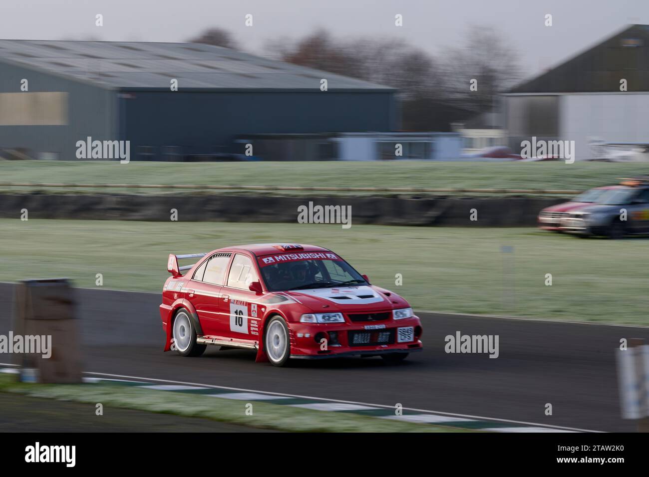 Rally car in action at the Goodwood Motor-racing circuit Stock Photo