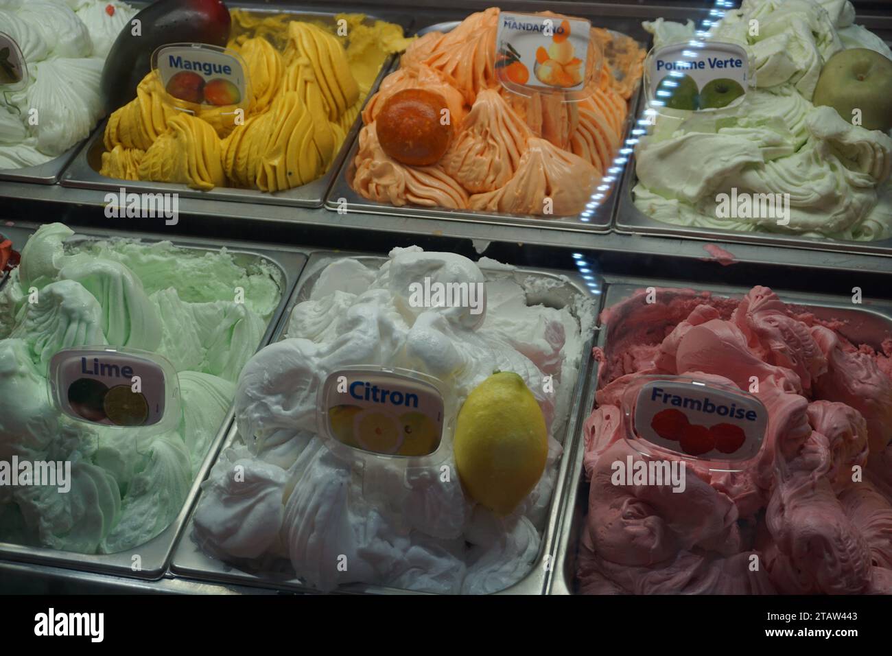 closeup of yummy colorful ice cream on display for sale in the freezer in france Stock Photo