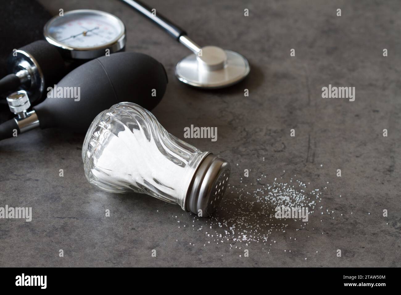 Salt shaker and blood pressure monitor, high salt content in diet and