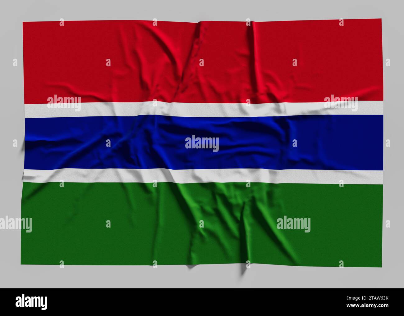 Flag of Gambia. Fabric textured Gambia flag isolated on white background. Stock Photo