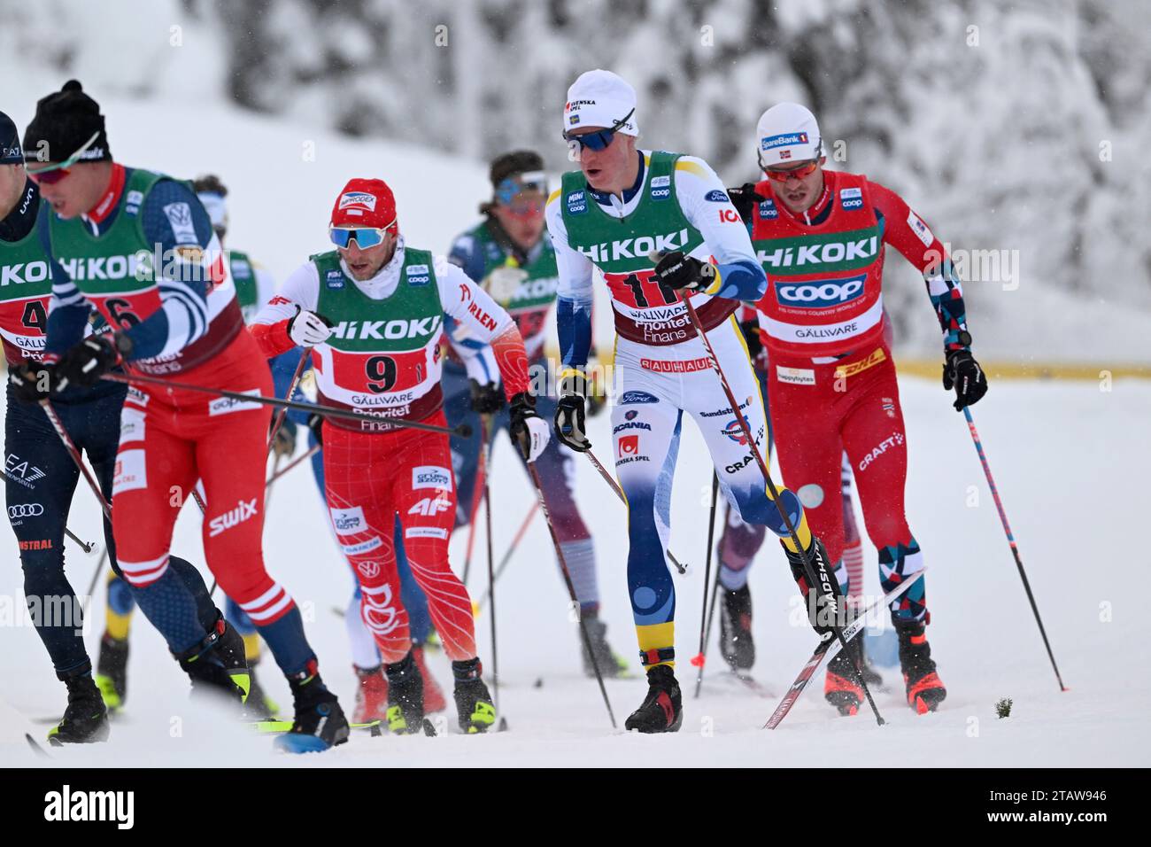 Alvar Myhlback of Sweden team II (c), Norges Paal Golberg of Norway (R) and Dominik Bury of Poland (#9, L)during the Men's 4x7, 5 km relay at the FIS Cross-Country World Cup competitions in Gallivare, Sweden December 03, 2023. Photo: Ulf Palm/TT/kod 9110 Credit: TT News Agency/Alamy Live News Stock Photo