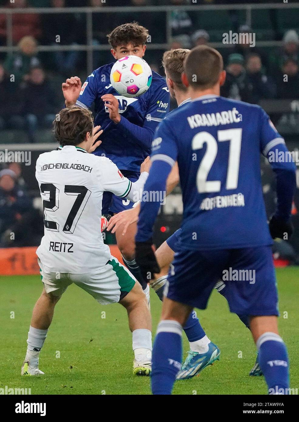 Mochengladbach, Deutschland. 02nd Dec, 2023. 02.12.2023, Borussia-Park, Mochengladbach, GER, 1.FBL, Borussia Monchengladbach vs TSG 1899 Hoffenheim, DFL regulations prohibit any use of photographs as image sequences and/or quasi-video. in the picture Rocco Reitz (M Gladbach), Andrej Kramaric (Hoffenheim), Tom Bischof (Hoffenheim) Credit: dpa/Alamy Live News Stock Photo