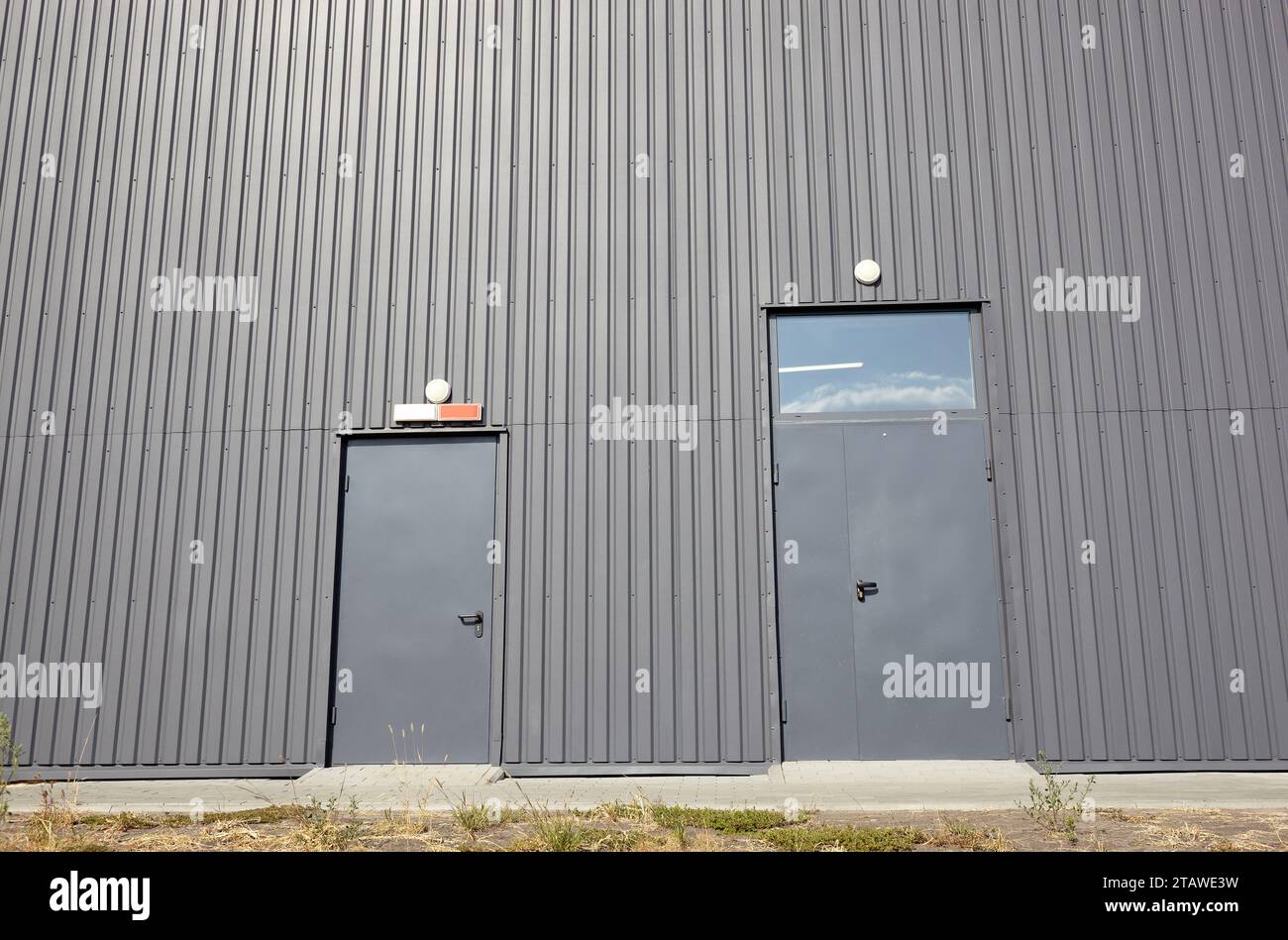 Corrugated steel warehouse or factory industrial building. Architecture