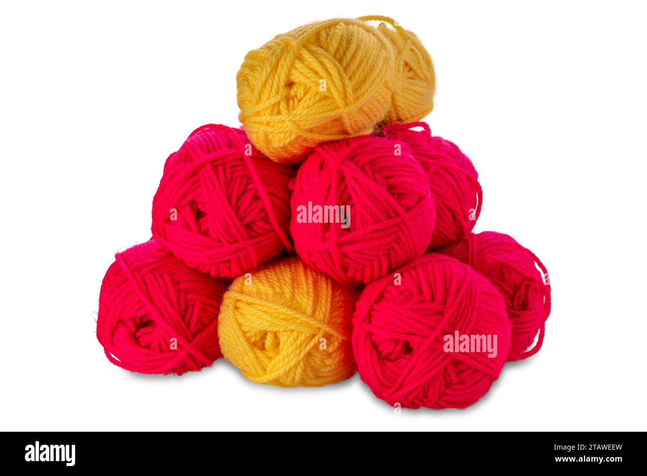 Balls of yellow and fuchsia-colored wool yarn isolated on white with clipping path included Stock Photo